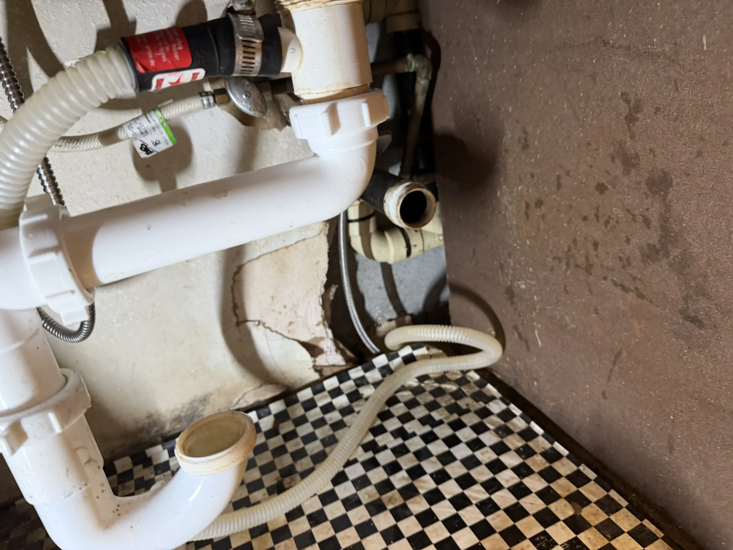 Rooter service technician clearing a clogged drain in Bothell, WA
